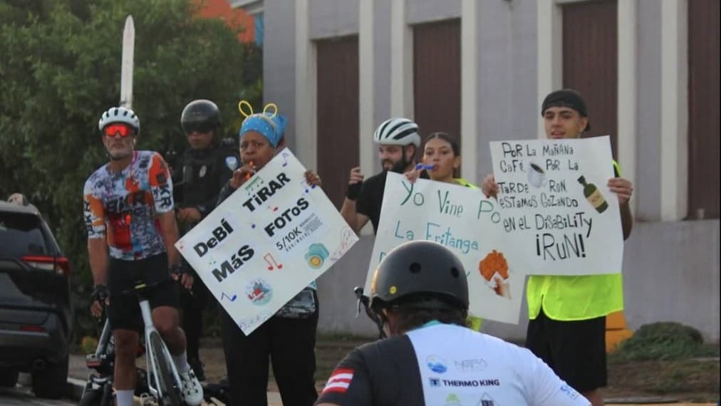 Wheelchair athletes and supporters at a race